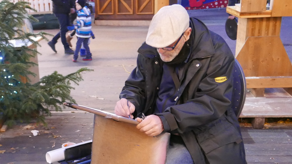 Kunsthandwerk Linz Weihnachtsmarkt Portraitmaler